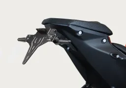 Set porta targa comprensivo di catarifrangente e luce targa