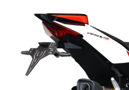 Set porta targa comprensivo di catarifrangente e luce targa